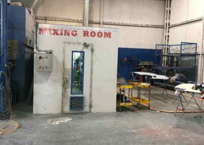The mixing room is a sealed unit which allows for auto body paint to be prepared in a non-contaminated environment