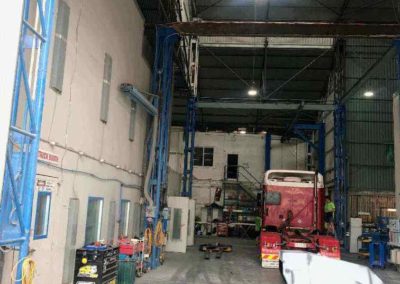 Shows one of the very large crash repair workshops available at Simpson Crash